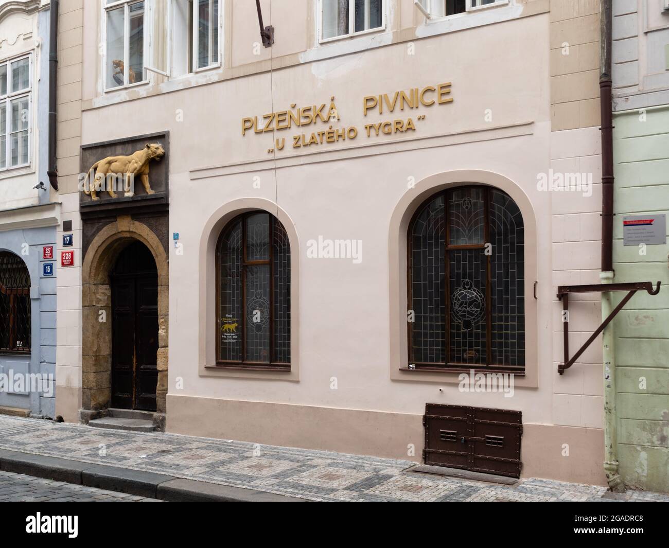 Prague, Czech Republic - July 3 2021: Plzenska Pivnice U Zlateho Tygra, Pilsner Beer Hall and Pub At the Golden Tiger in the Old Town. Stock Photo