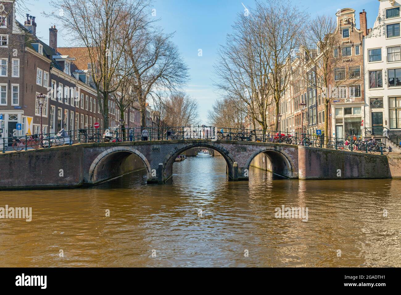 Bridge with arches, Herengracht and Leidsegracht canals, Amsterdam Stock Photo