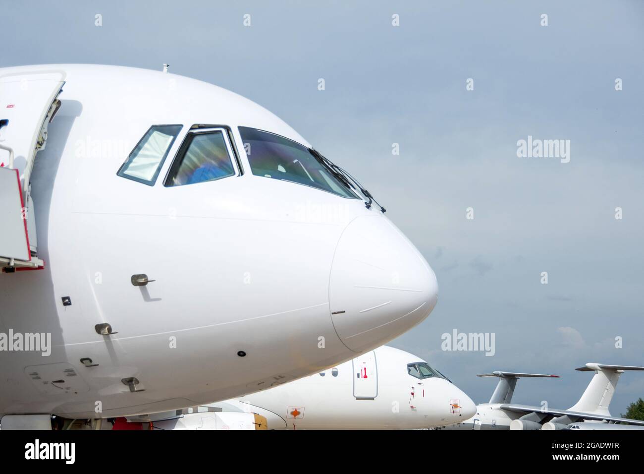 The cockpit and the nose of the aircraft parked at the airport Stock ...