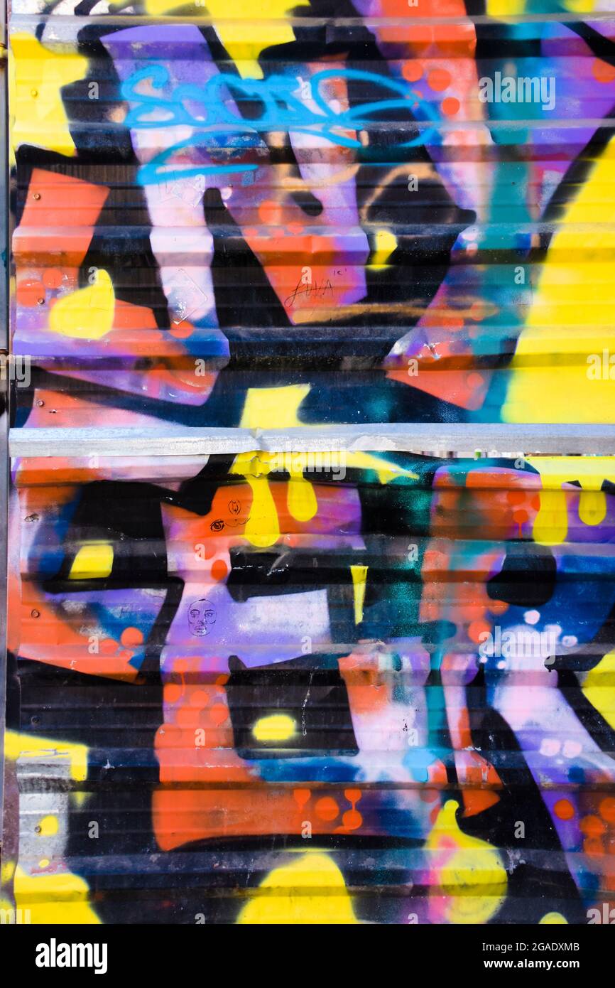 Abstract colored graffiti with letters Stock Photo - Alamy