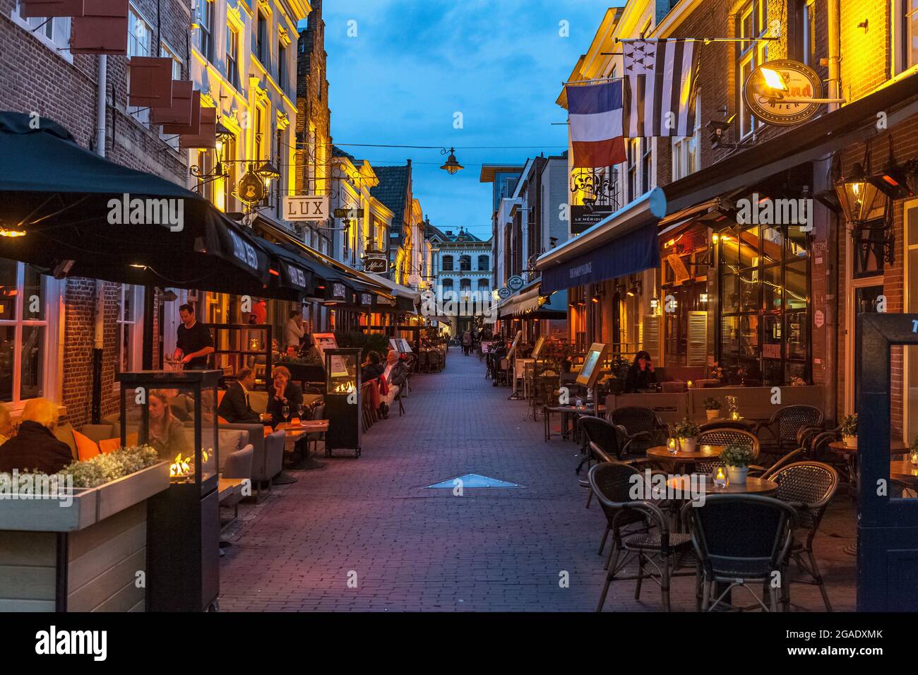 Street cafés at dusk, Den Bosch, the Netherlands Stock Photo