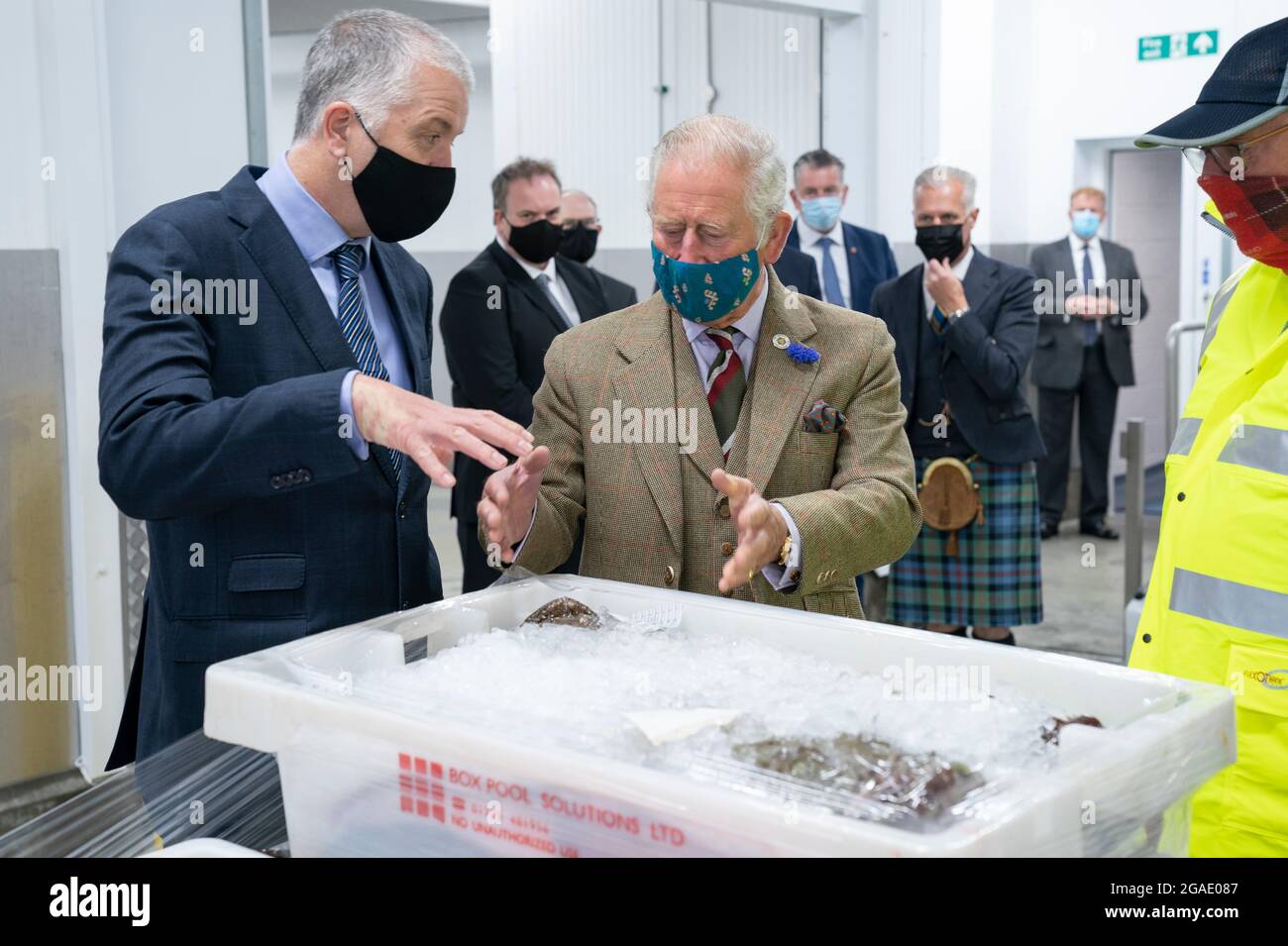 The Prince of Wales, known as the Duke of Rothesay when in Scotland, officially opens the Lerwick Harbour and Scalloway Fish Markets at Shetland Seafood Auctions Ltd at Lerwick Fishmarket, in Lerwick, Shetland, on the second day of a two-day visit to Scotland. Picture date: Friday July 30, 2021. Stock Photo