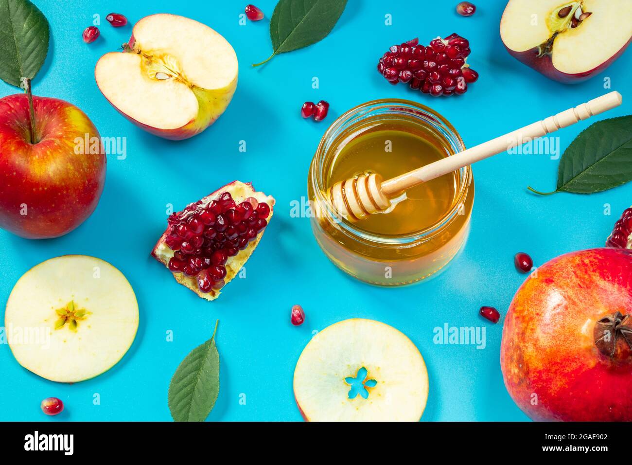 Happy Rosh Hashanah. Pattern from apples, honey and pomegranates on a