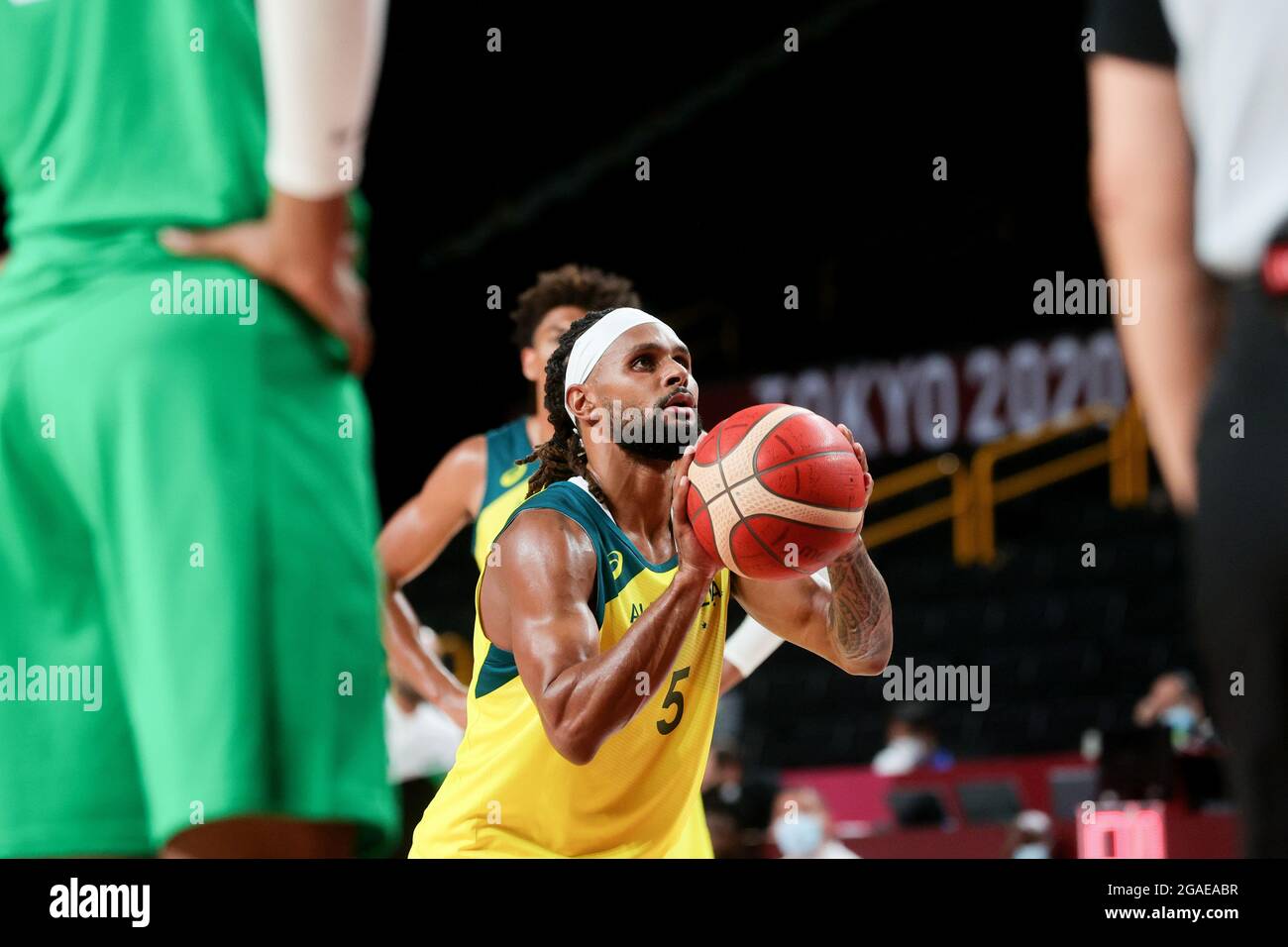 Tokyo, Japan, 25 July, 2021. Patty Mills of Team Australia shoots from free throw line during the Men's Basketball preliminary Round Group B  - Match 3 between Australia and Nigeria on Day 2 of the Tokyo 2020 Olympic Games. Credit: Pete Dovgan/Speed Media/Alamy Live News Stock Photo