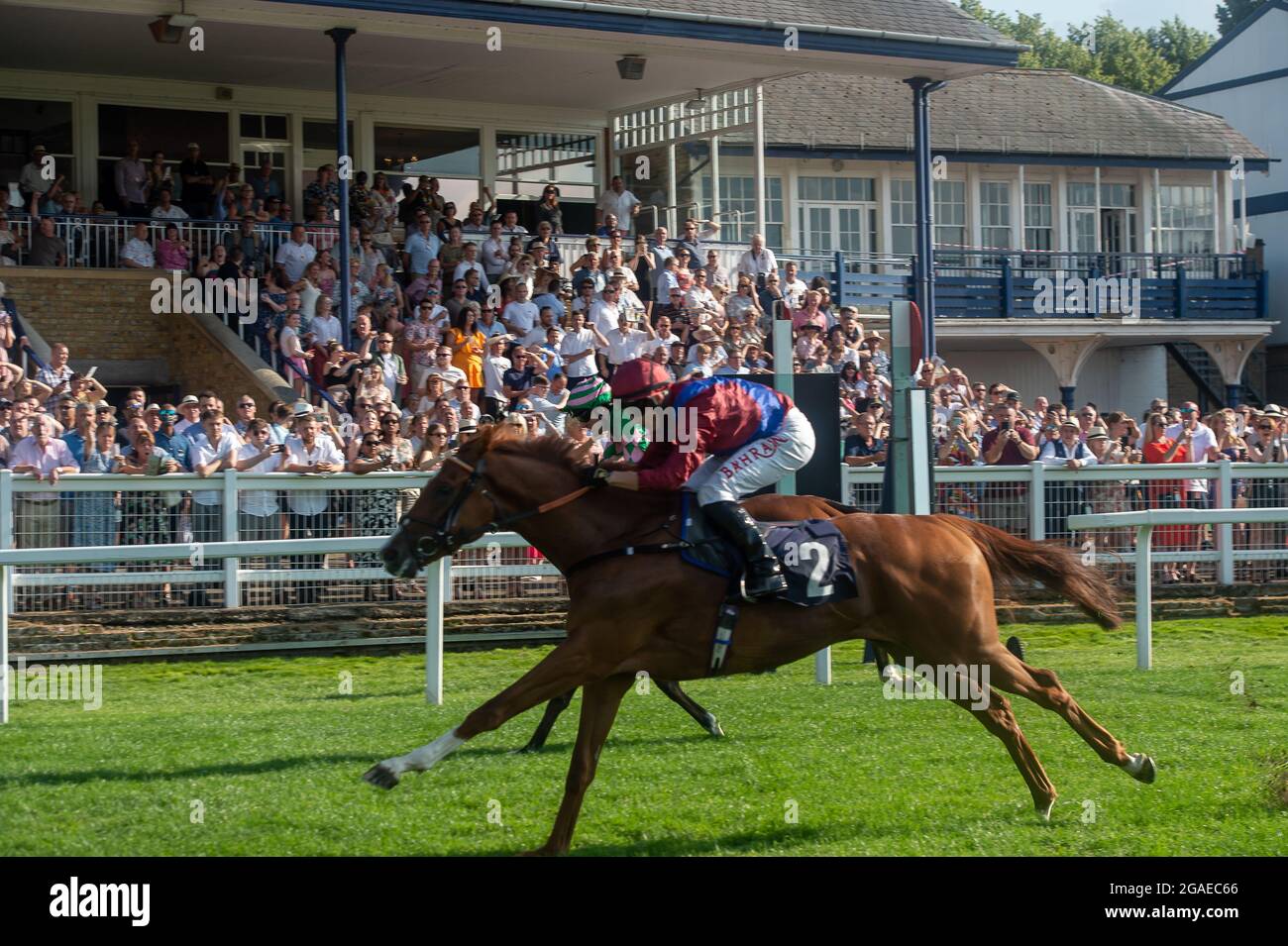 Windsor, Berkshire, UK. 19th July, 2021. Jockey Tom Marquand (R) wins the  Free Tips Daily on Attheraces.com Handicap Stakes on horse Diamond Bay  trained by Tom Ward, Upper Lambourn. Credit: Maureen McLean/Alamy