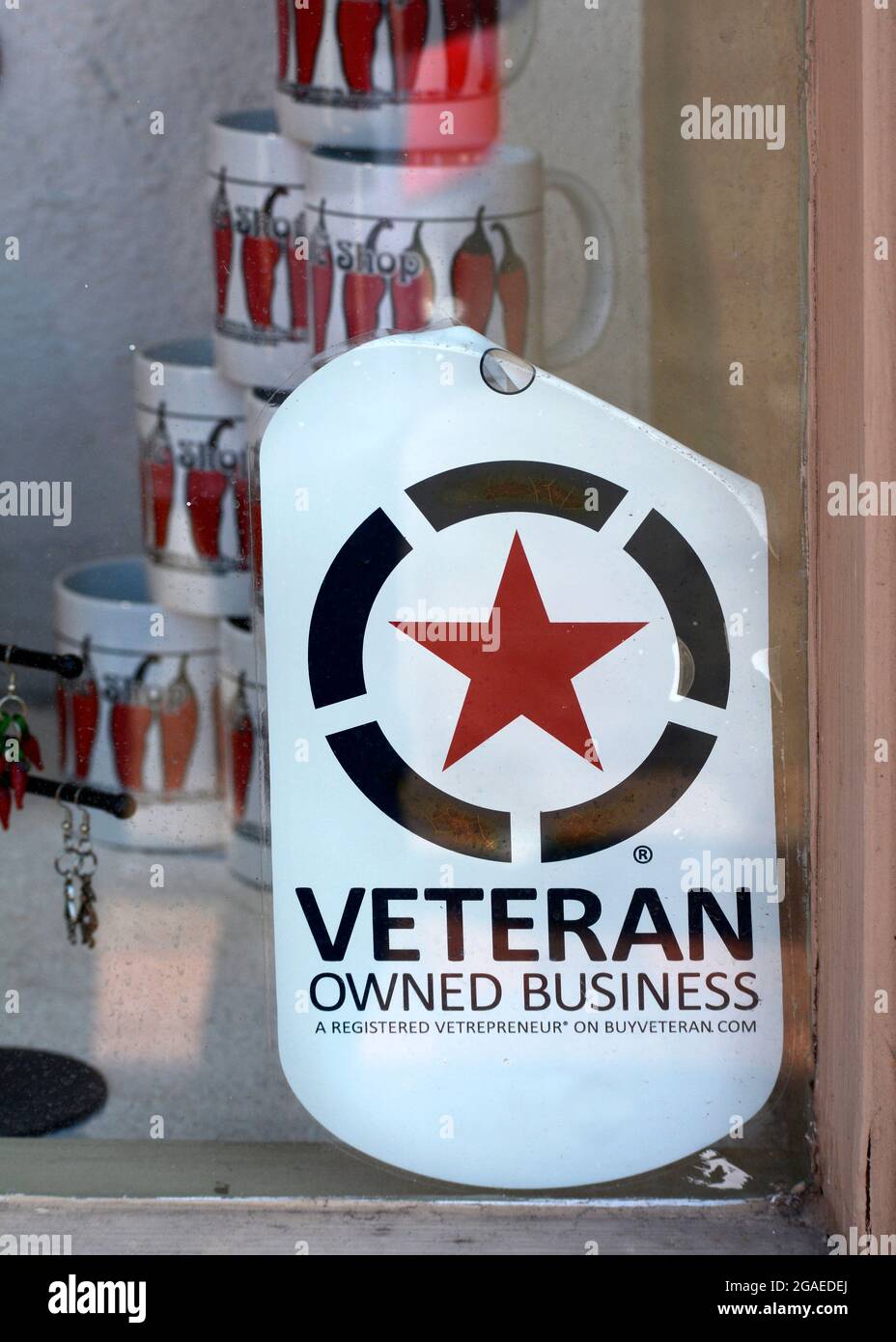 A sign in the window of a business owned by a U.S. military veteran in Santa Fe, New Mexico. Stock Photo