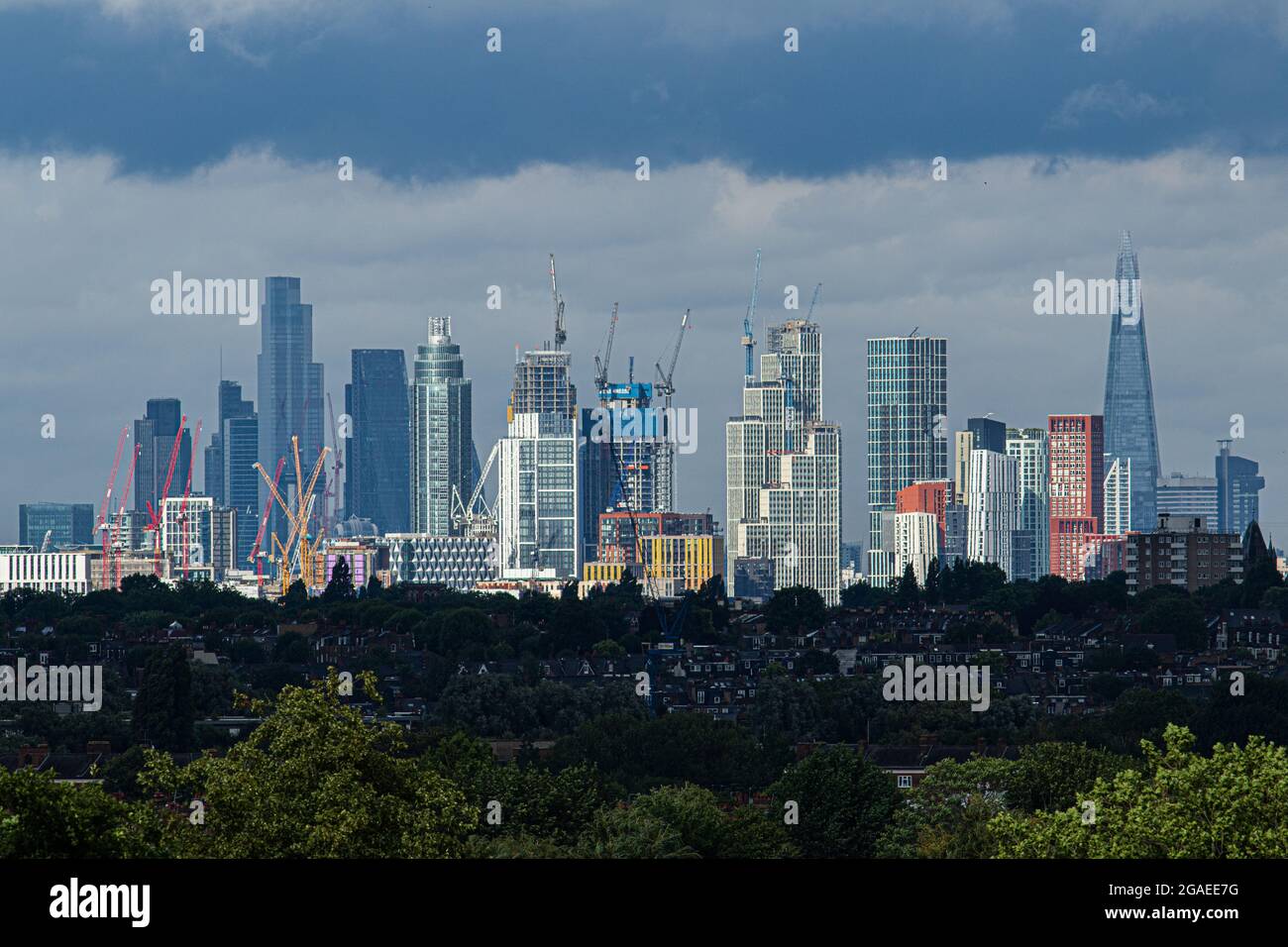 London, UK. 30 July 2021. The London Shard and city skyline financial district is shrouded under storm clouds with unpredictable weather of sunshine showers and gale force winds from Storm Evert in London and southern parts of England. Credit amer ghazzal/Alamy Live News. Stock Photo