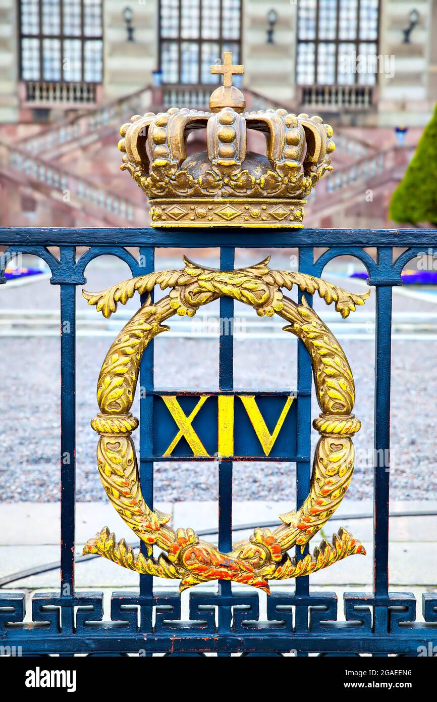 Fence with crown in front of Royal Palace in Stockholm, Sweden Stock Photo