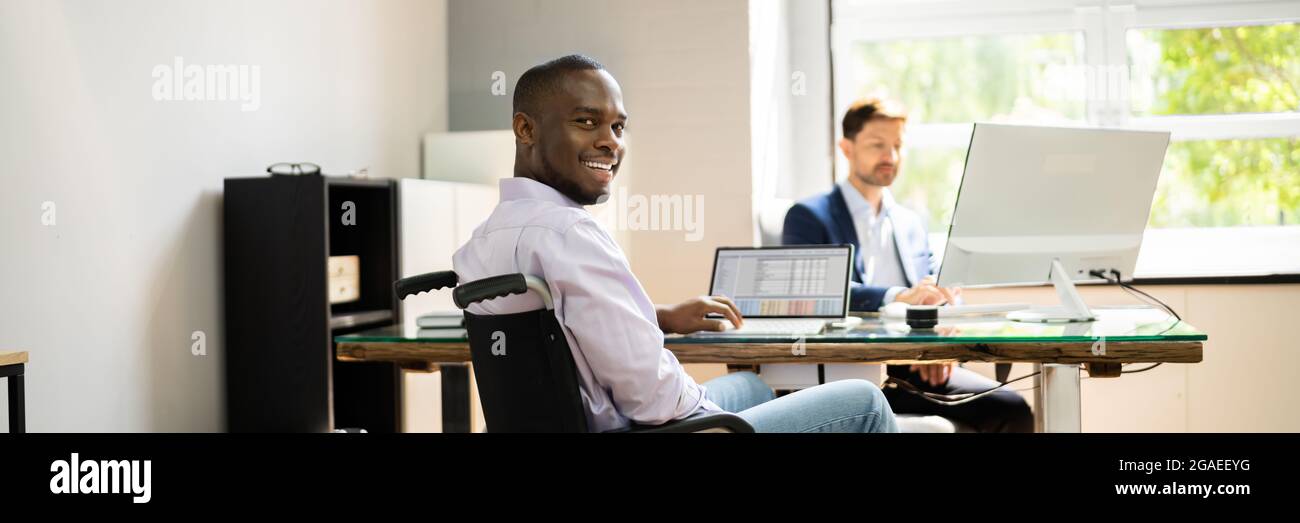 African American Handicapped Man Employee. People In Wheel Chair Stock Photo