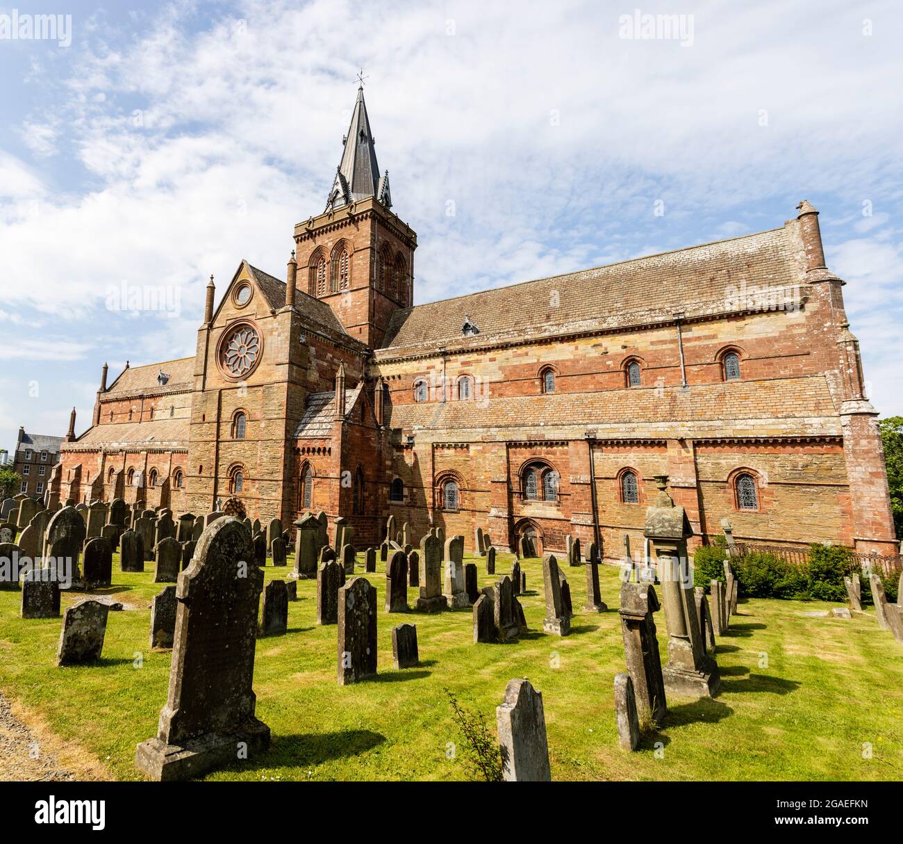 St Magnus Cathedral, Kirkwall dominates the skyline of Kirkwall, the main town of Orkney, a group of islands off the north coast of mainland Scotland. Stock Photo