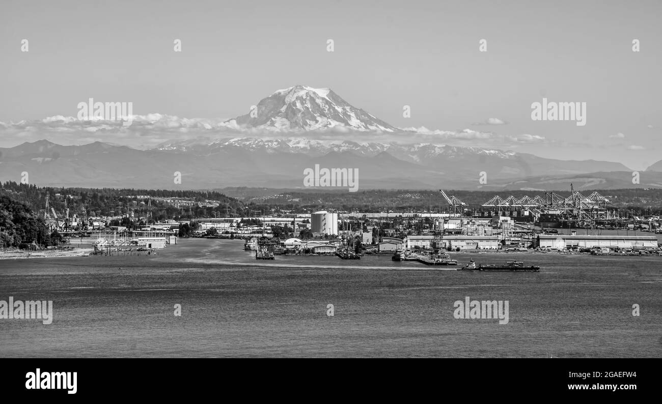 Mount Rainier with little snow in summer and the Port of Tacoma Stock ...