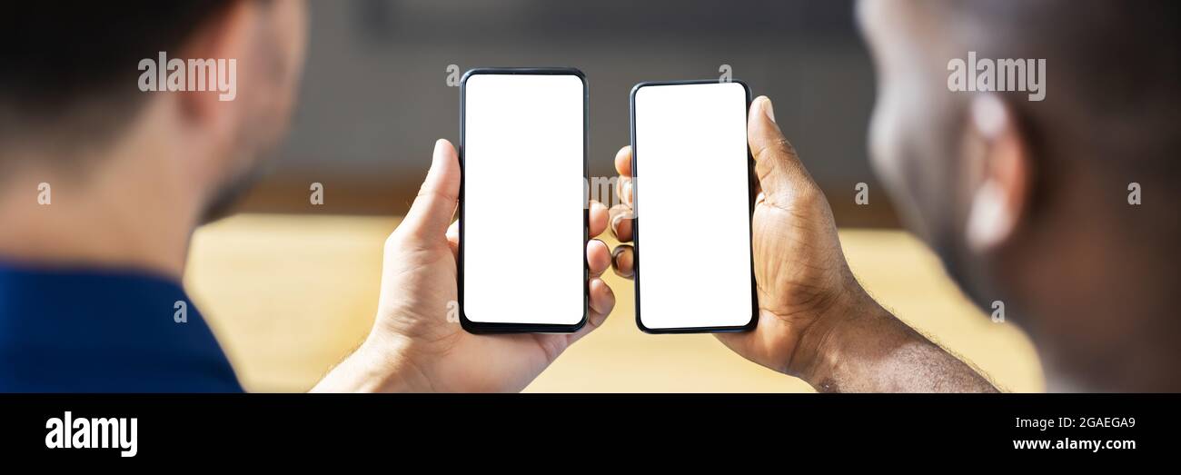 Holding Mobile Phone In Hand. Smartphone In Hands Stock Photo