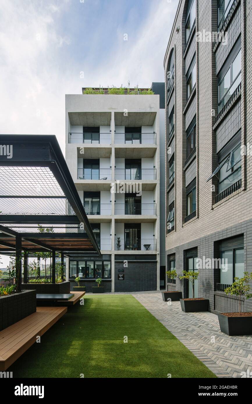 Recreation courtyard on the West side and facades. Brooklyn House