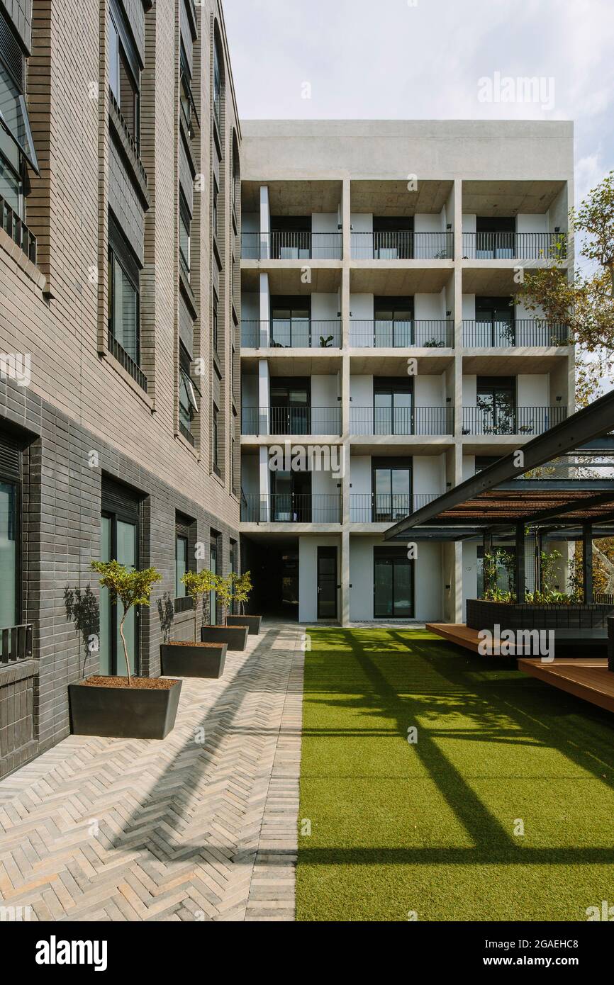 Recreation courtyard on the West side and facades. Brooklyn House