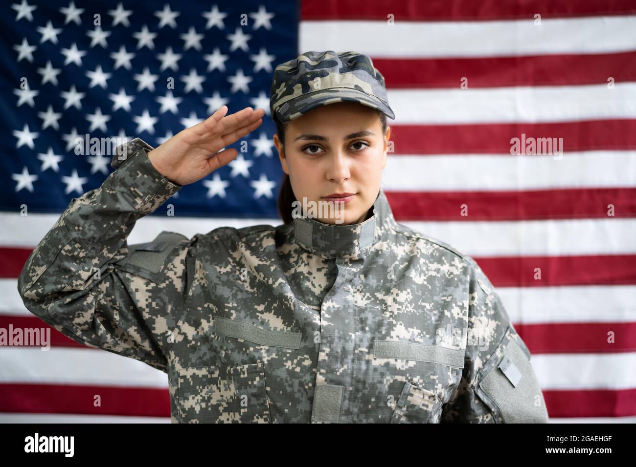 US Army Military Soldier Veteran Portrait Against Flag Stock Photo