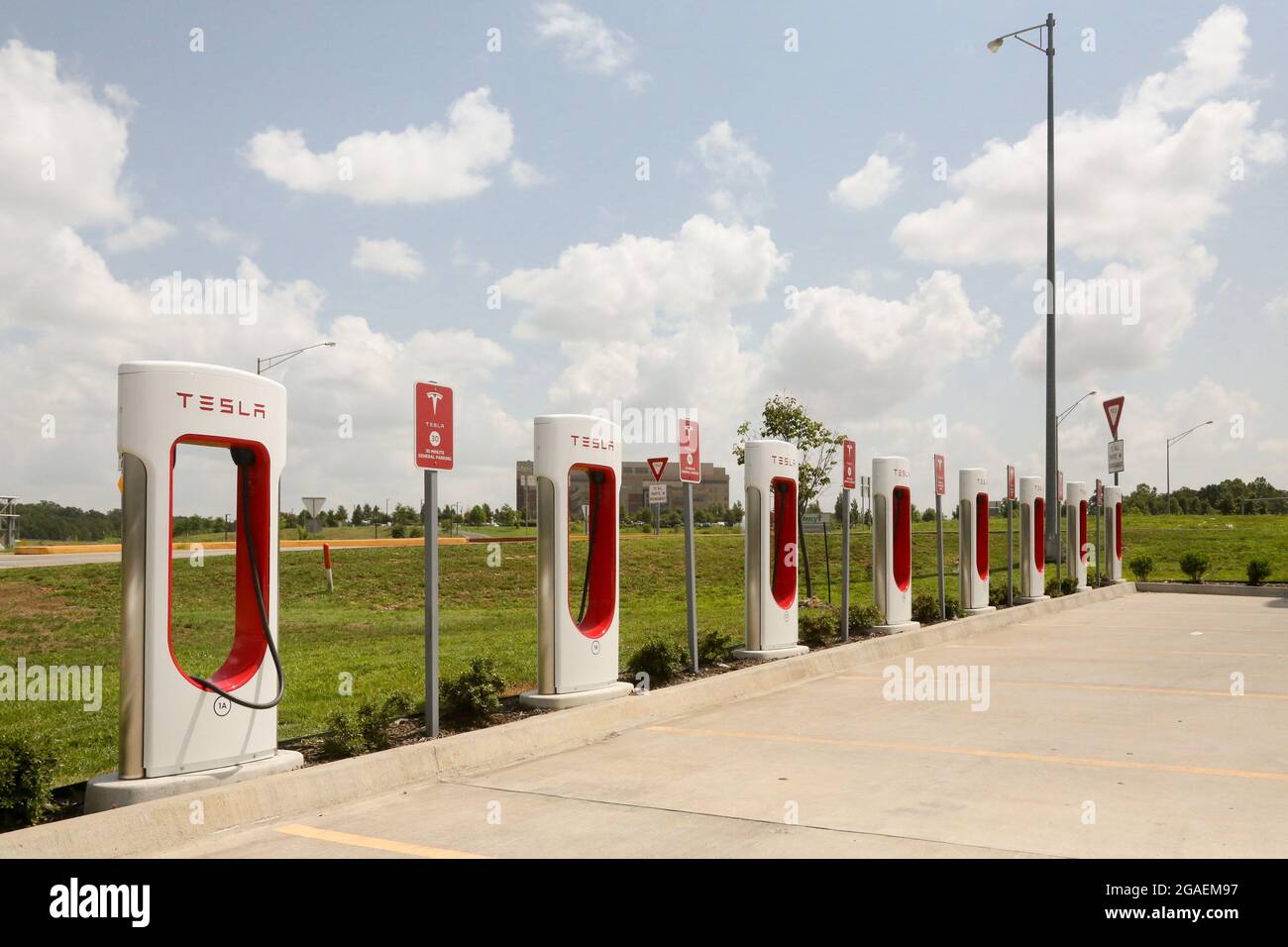 In Southern Missouri off an I40 highway ramp at a Kum & Go gas station is a Tesla Supercharger