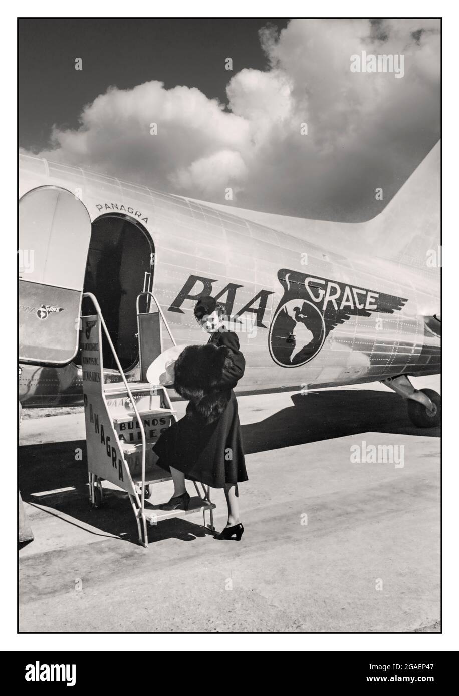 Archive Air Travel Boarding DC3 PAA aircraft Stylish fashion concious woman holding a fur coat and sombrero boarding a Pan American-Grace Airways (Panagra) airplane heading to Buenos Aires, Argentina] Golden age of flying in style 1930s 1940s Creator(s): Frissell, Toni, 1907-1988, photographer Created/Published: [Nov. 1939] Stock Photo