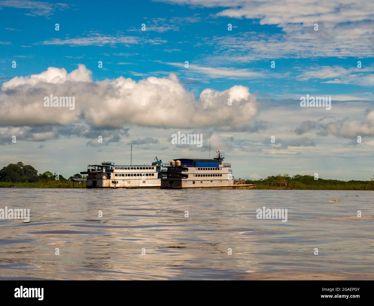 Santa Rosa, Peru - May, 2016: Passenger and cargo ferry boats on the bank of Amazon river. Amazonia. Latin America. Stock Photo