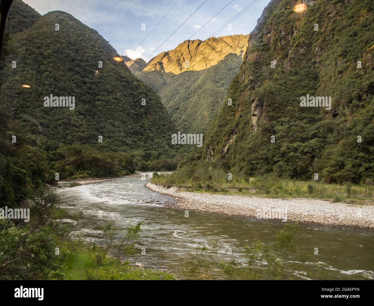 Urubamba River flowing in the Sacred Valley of Inca and view of the Andes, Peru, Cusco Province, South America. Stock Photo