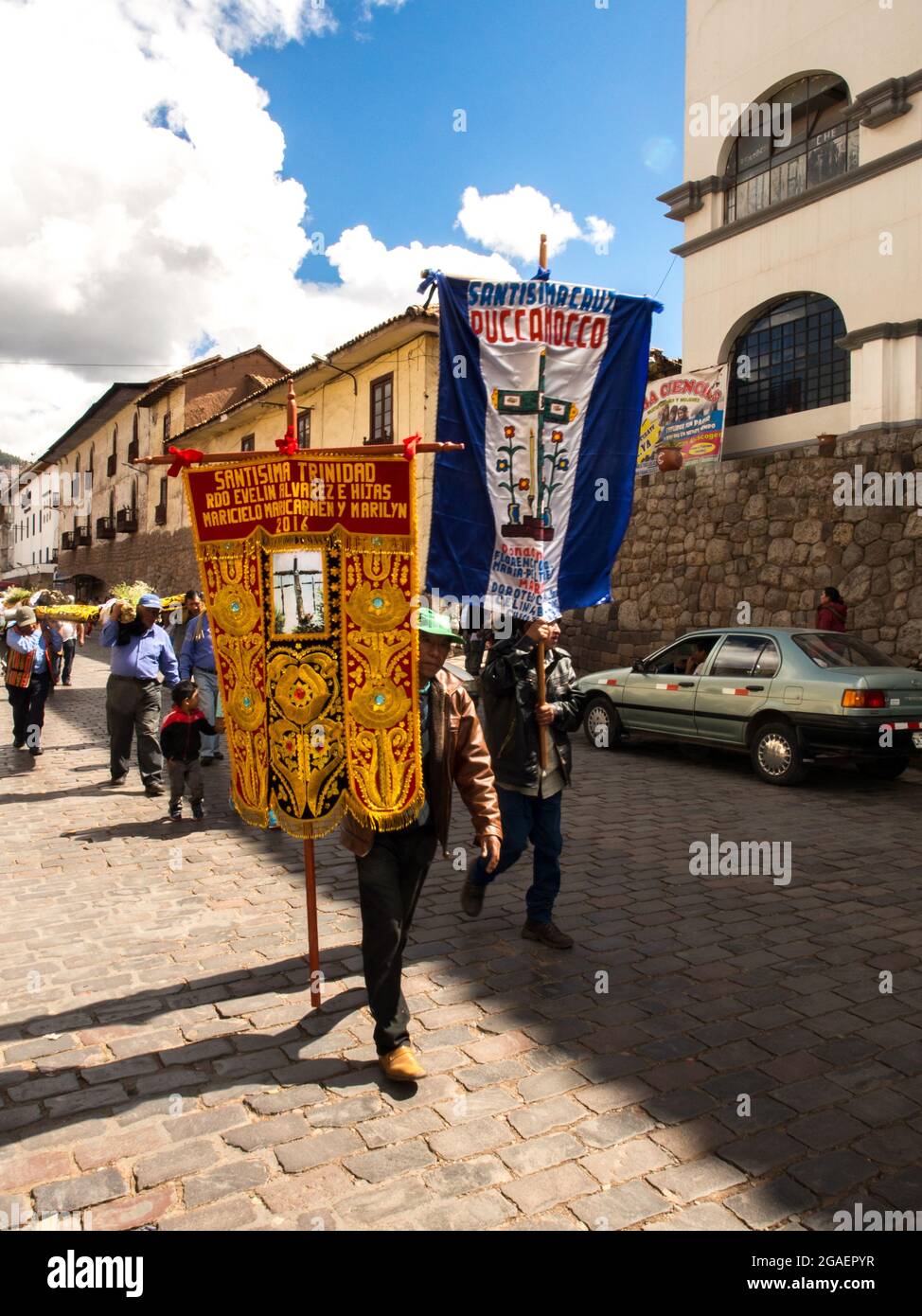 Cusco, Peru - May 2016: Procession with banners on the street in Cusco. Sacred Valley, South America Stock Photo