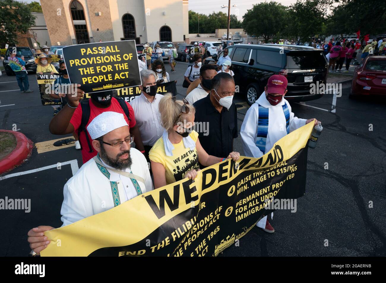 Austin, Texas USA, July 30, 2021: Faith leaders headed by legendary Democratic activist JESSE JACKSON (in black) as voting rights groups march toward the Texas Capitol from north Austin on the third day of a 30-mile journey protesting Republican efforts to suppress votes nationwide and in Texas. Credit: Bob Daemmrich/Alamy Live News Stock Photo