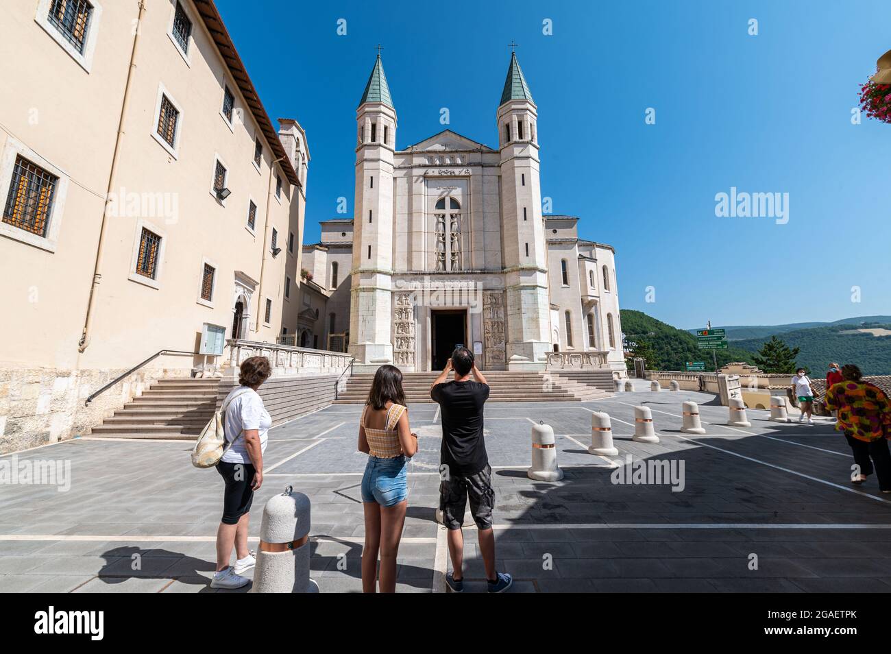 cascia,italy july 30 2021:tourists taking their photo in front of the  cathedral of santa rita da cascia Stock Photo - Alamy