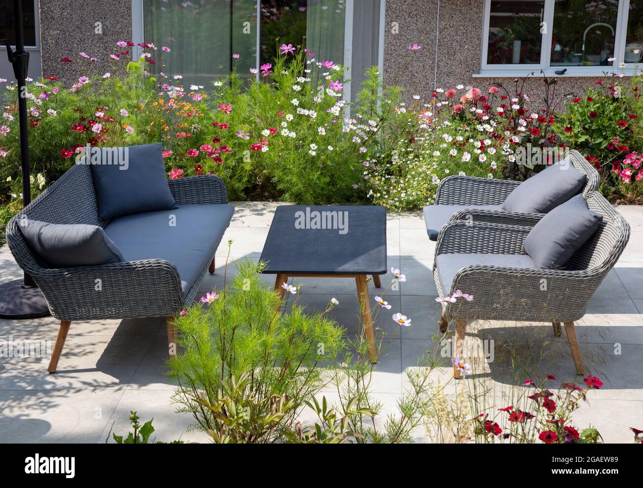 Garden furniture on the terrace on sunny day Stock Photo