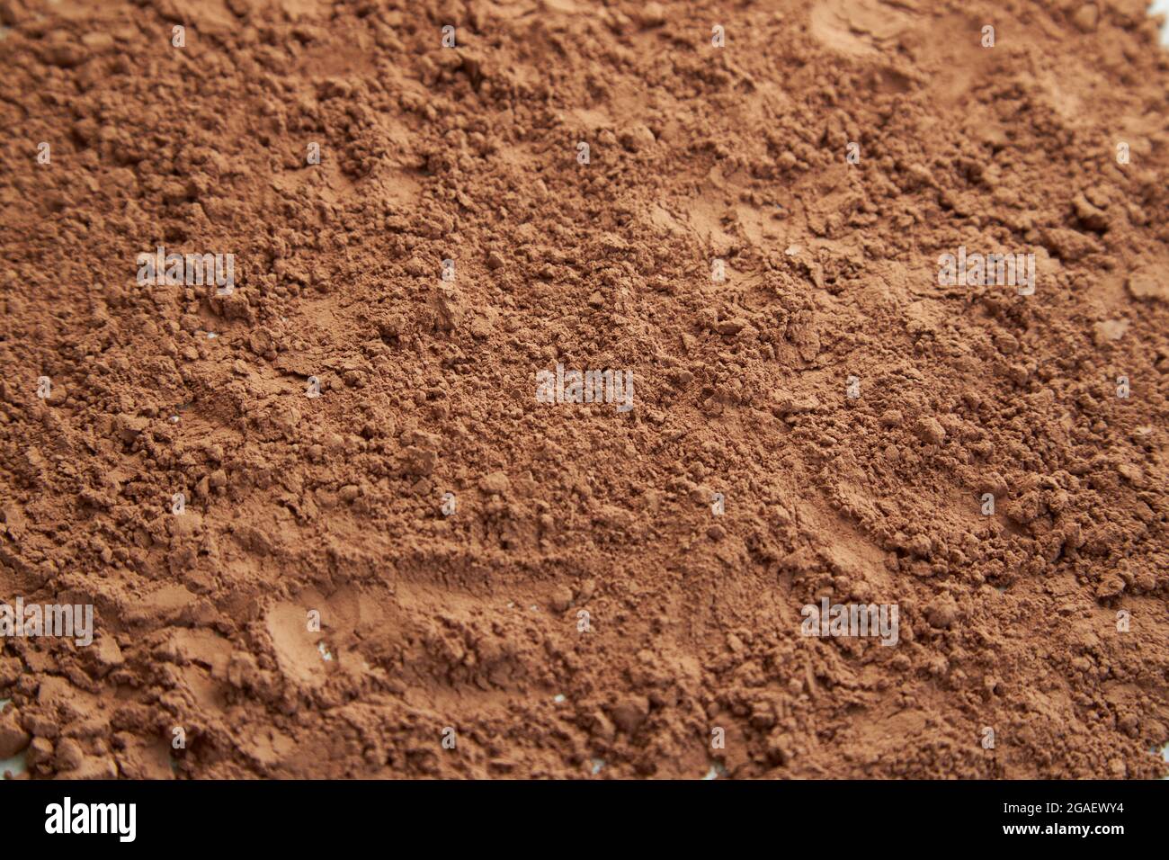 Tasty cocoa powder,texture background. Top view. Stock Photo