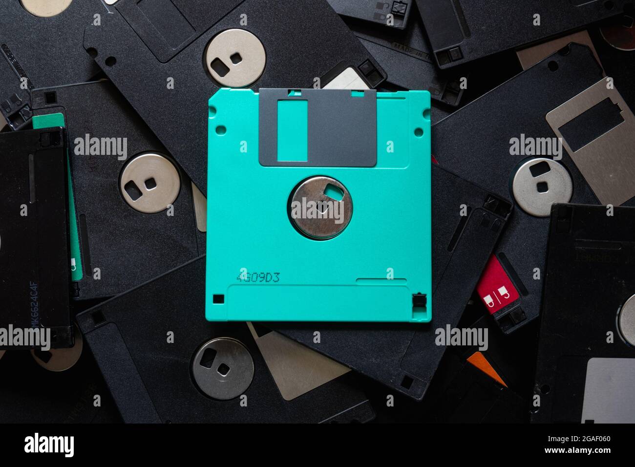 A square floppy disk is a magnetic disk for storing data in an old computer with a small capacity, but floppy disks were still popular in those days b Stock Photo