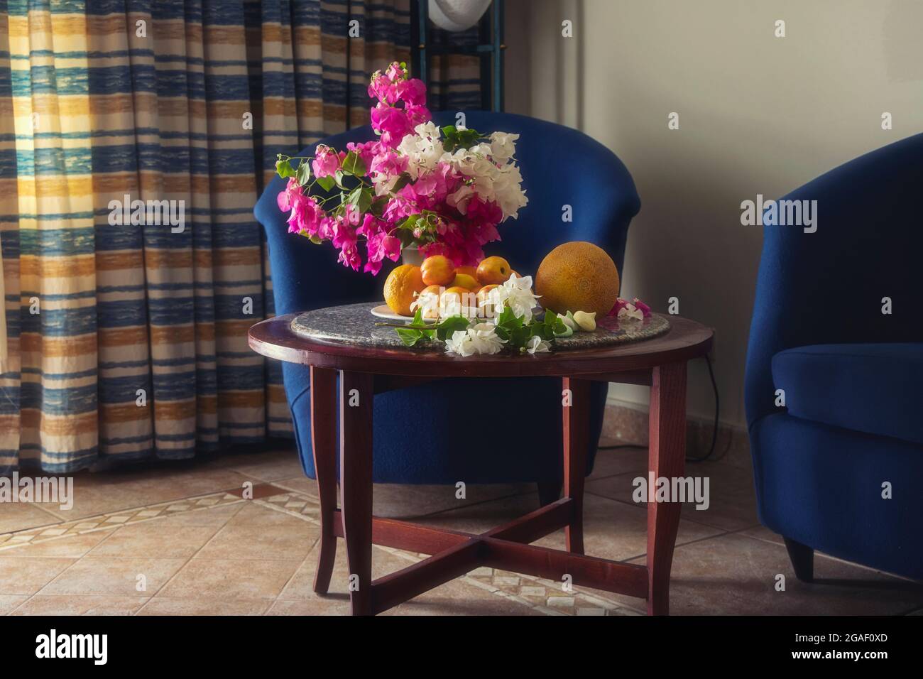 Still life with flowers and fruits Stock Photo - Alamy