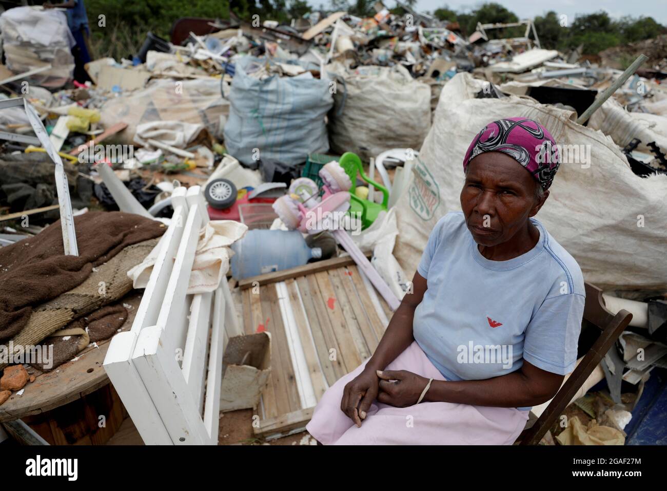 lauro de freitas, bahia, brazil - march 14, 2019: elderly woman collecting material for recycling at a landfill in the city of Lauro de Freitas. Stock Photo
