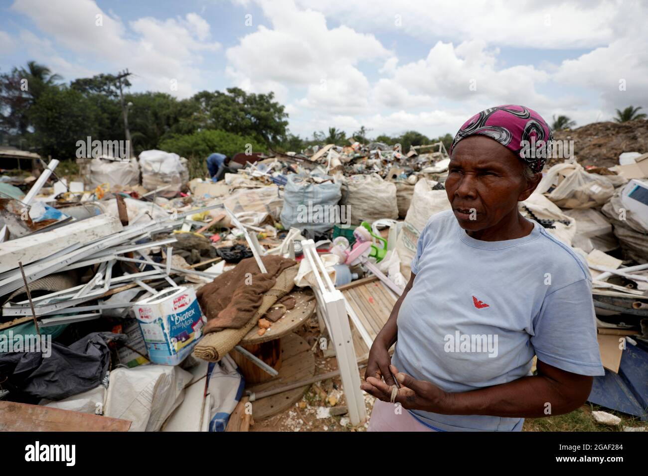 lauro de freitas, bahia, brazil - march 14, 2019: elderly woman collecting material for recycling at a landfill in the city of Lauro de Freitas. Stock Photo