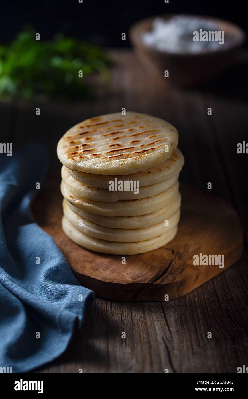 Arepa is a type of meal made from ground corn dough, cornmeal ...