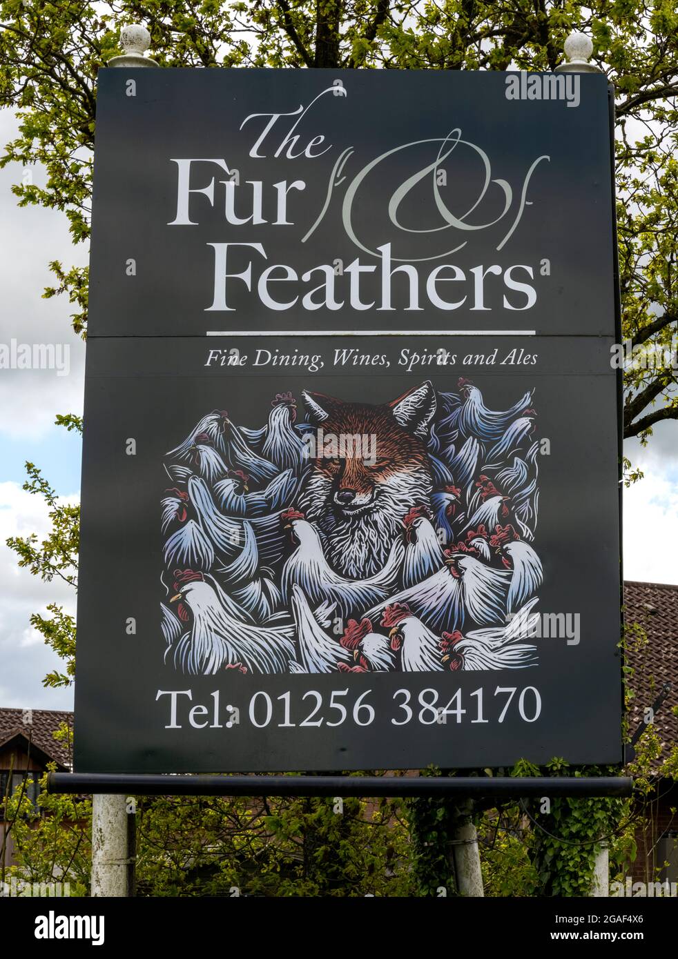 Pub sign for The Fur and Feathers Free House, King Johns Lane, Southrope, Basingstoke, Hampshire, England, UK Stock Photo
