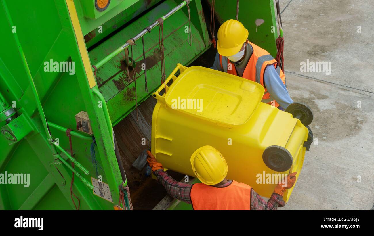 The top view garbage man working together Stock Photo