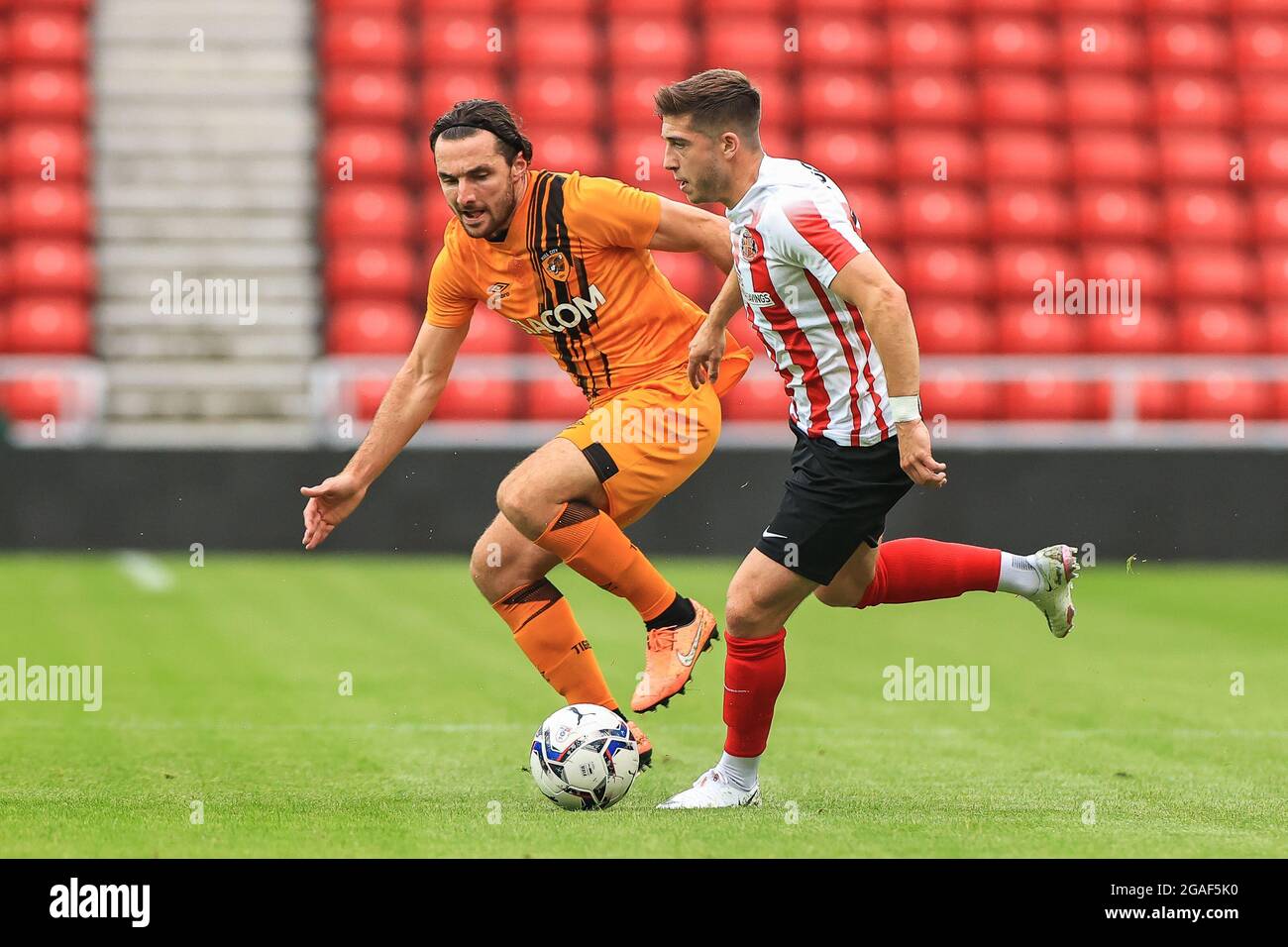 Lewis Coyle #2 of Hull City tracks Lynden Gooch #11 of Sunderland as he breaks with the ball in, on 7/30/2021. (Photo by Mark Cosgrove/News Images/Sipa USA) Credit: Sipa USA/Alamy Live News Stock Photo