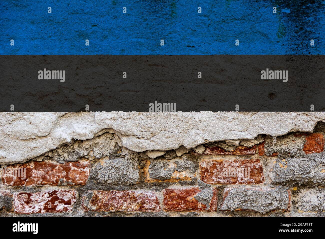 Graphic Concept with a Flag of Estonia painted on a damaged brick wall ...