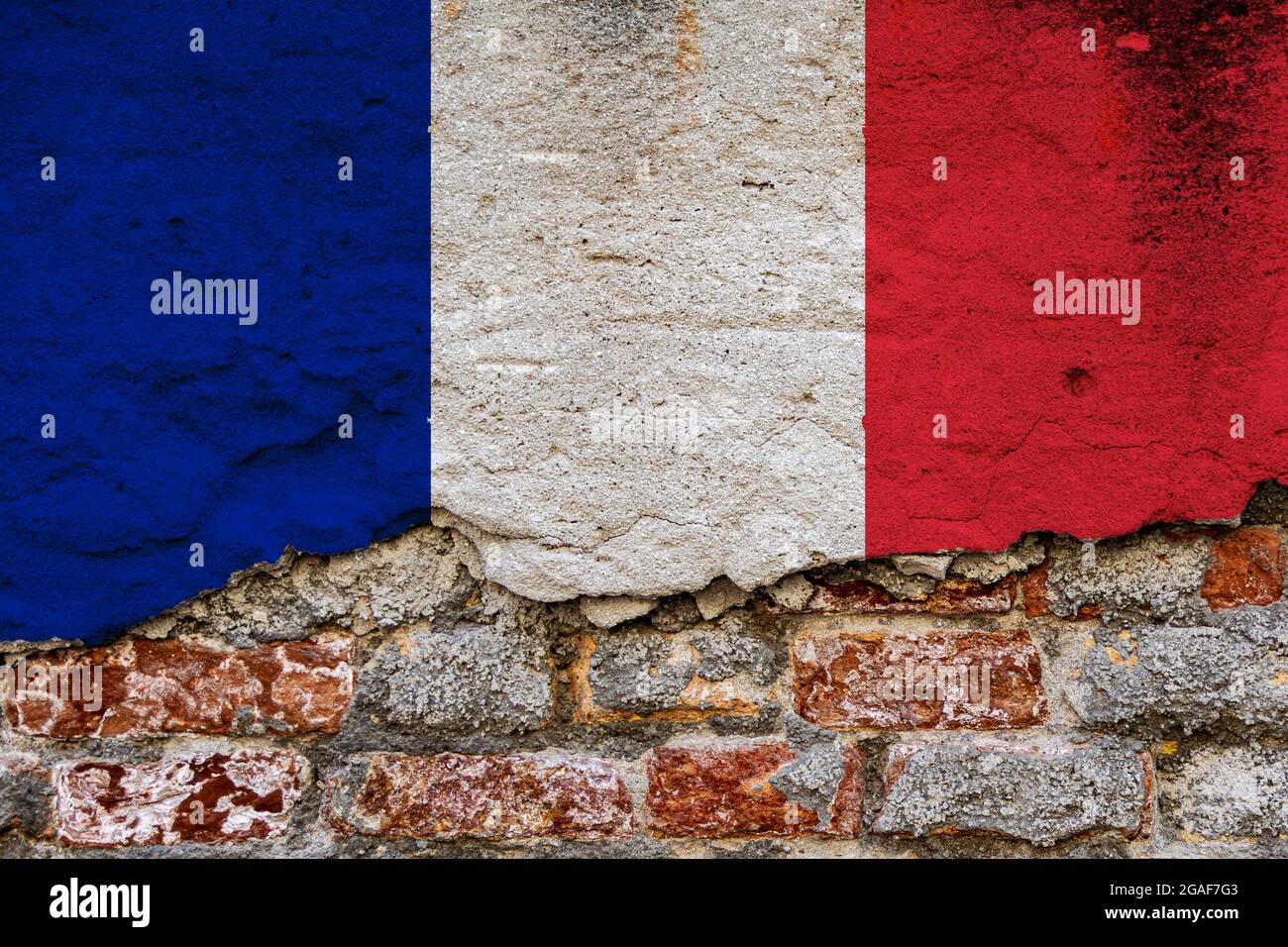 Graphic Concept with a Flag of France painted on a damaged brick wall ...