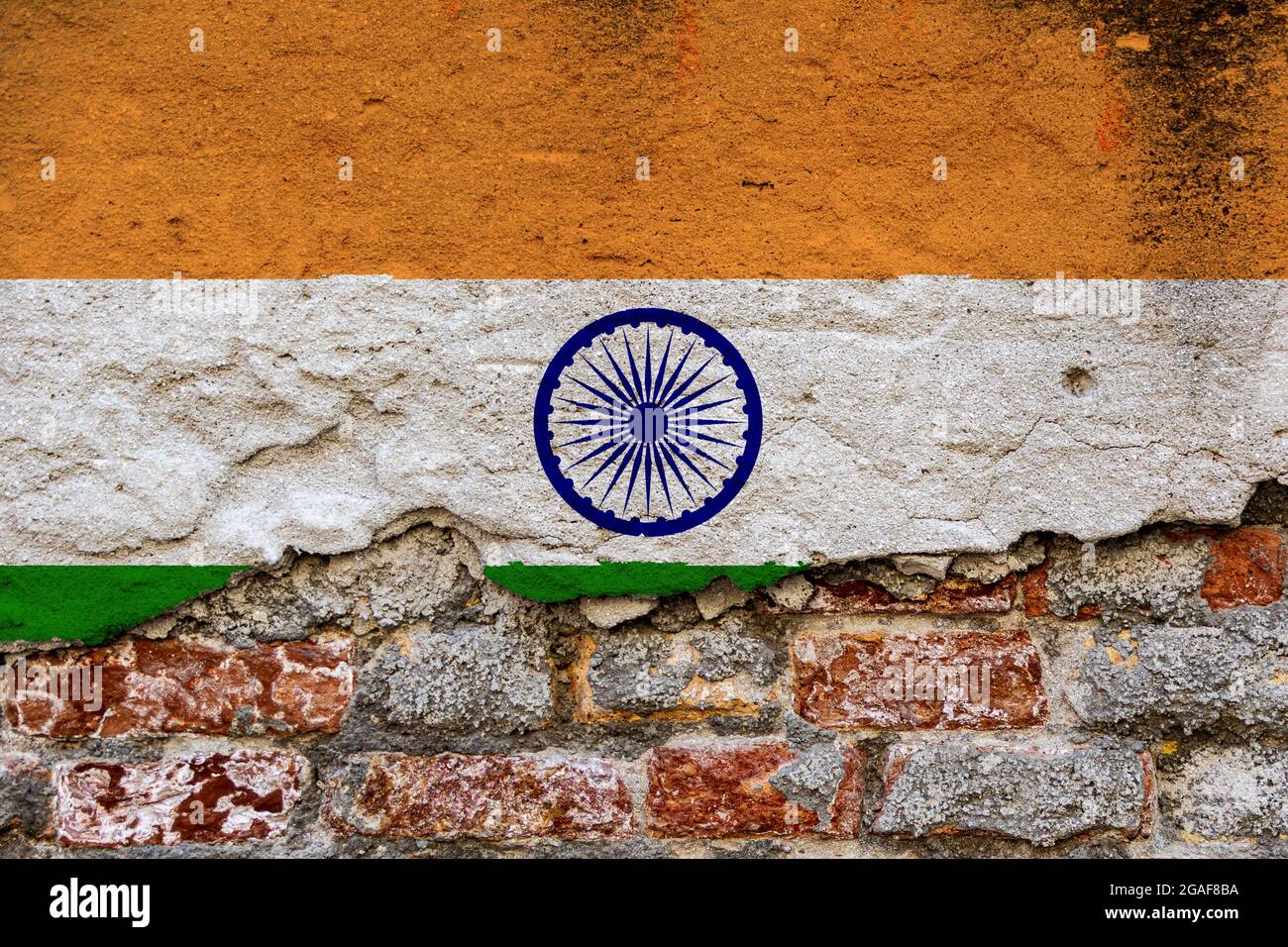 Graphic Concept with a Flag of India painted on a damaged brick wall ...