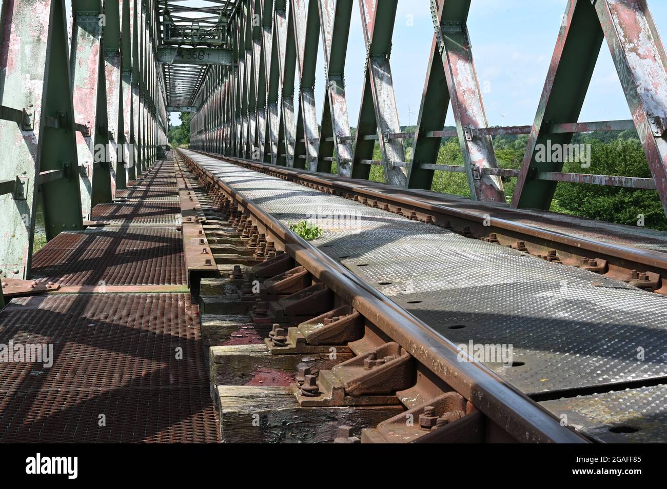 Old steel trussed railway bridge Stock Photo