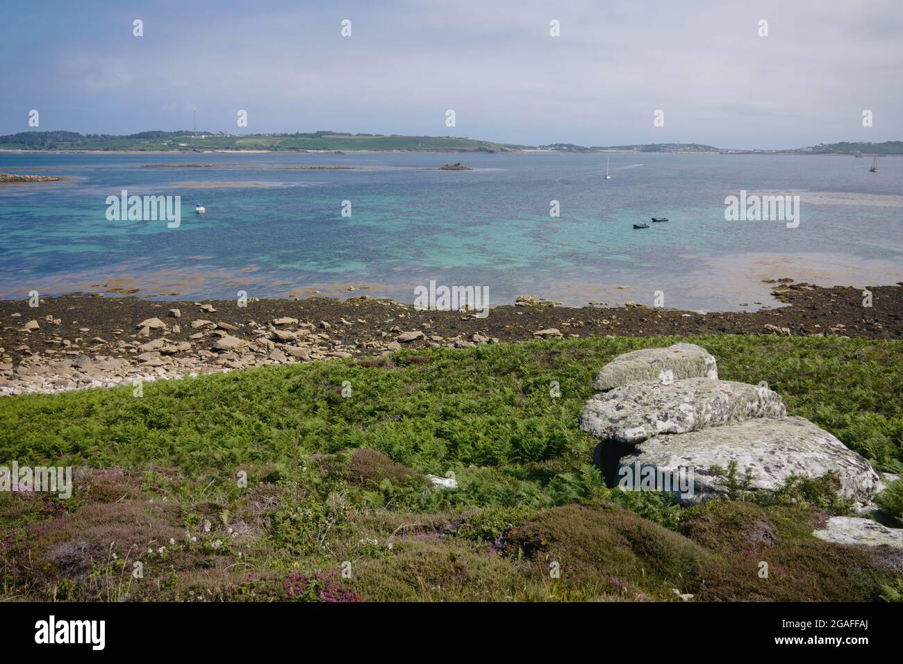 Carn Near quay / bay, Tresco island, Isles of Scilly, Cornwall, England, UK, July 2021 Stock Photo