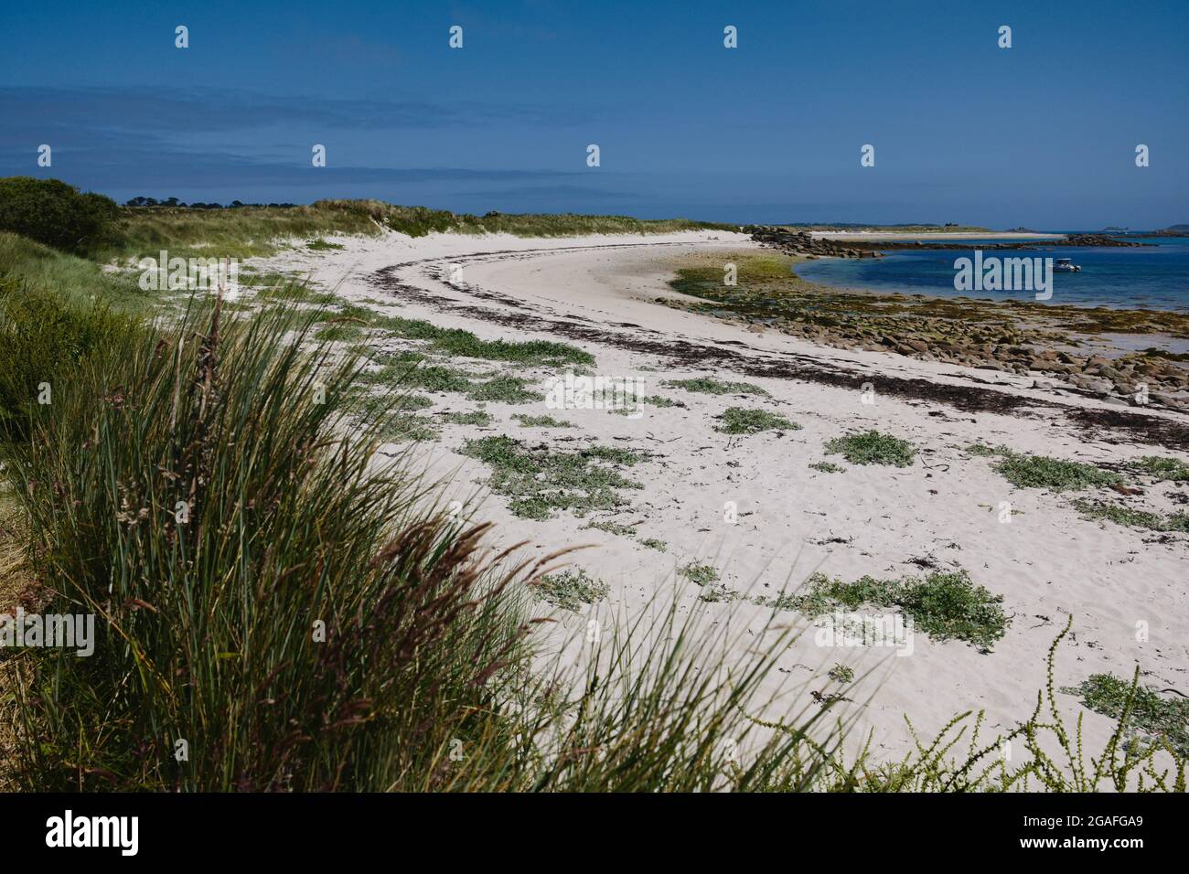 Sandy beach on the west side of Tresco island, Isles of Scilly, Cornwall, England, UK, July 2021 Stock Photo