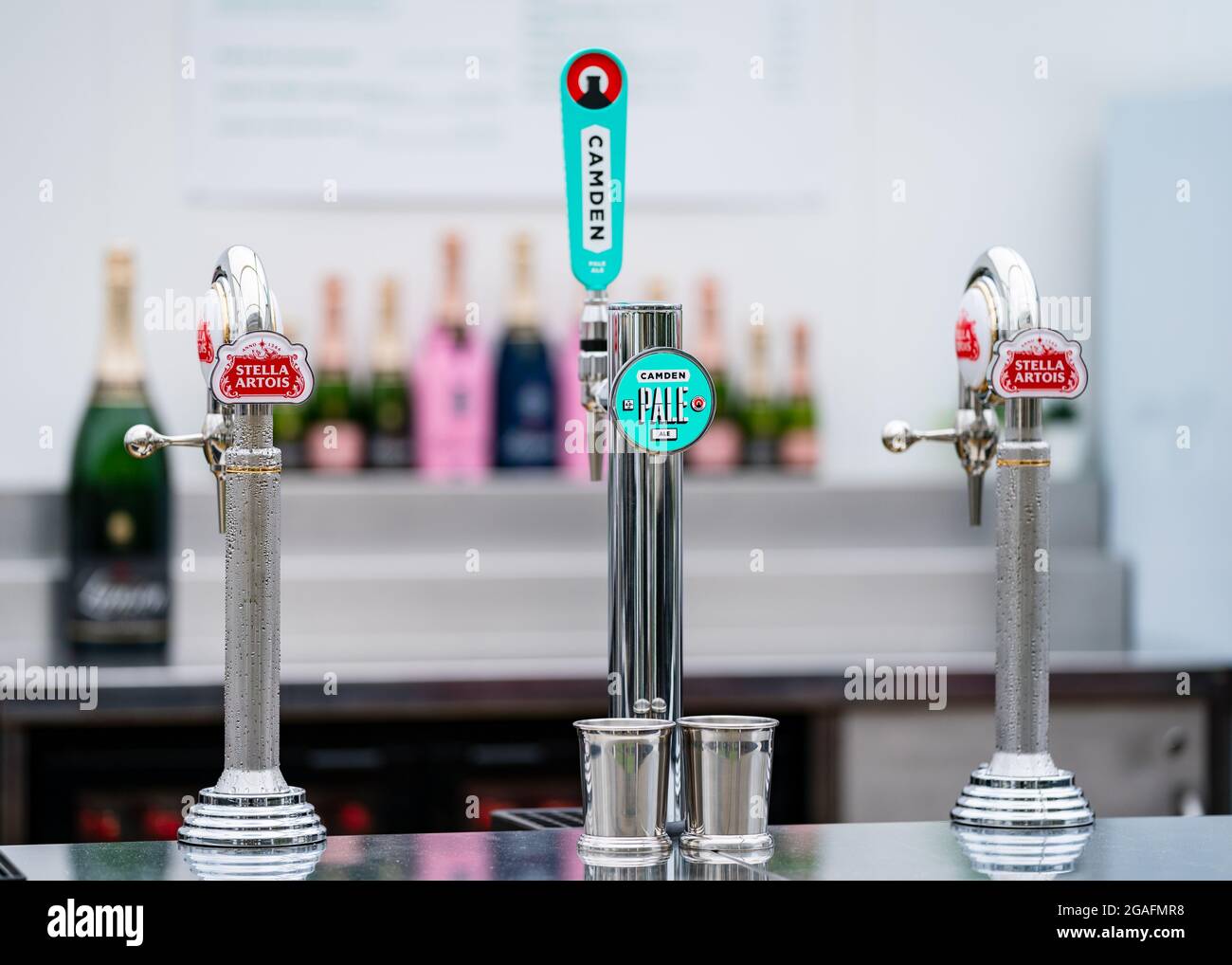 Stella Artois and Camden Town Brewery beer pumps at a Bar Stock Photo