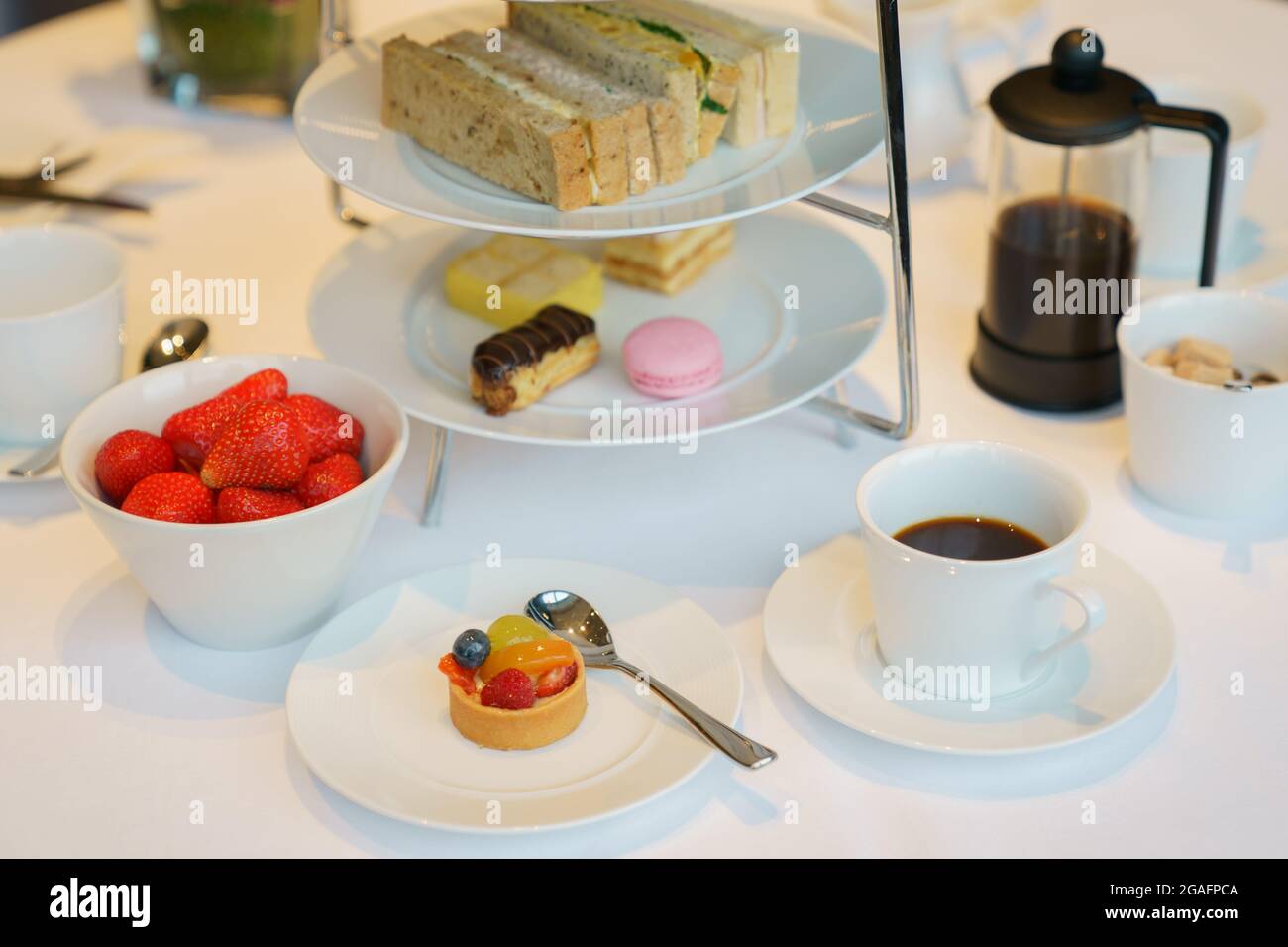 Gourmet Afternoon Tea offered at a restaurant Stock Photo - Alamy
