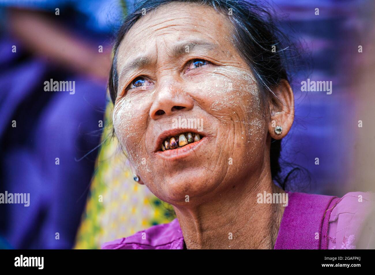 Close up portrait of Burmese female with badly stained betel nut addiction teth, Mine Thauk, Inle Lake, Myanmar Stock Photo
