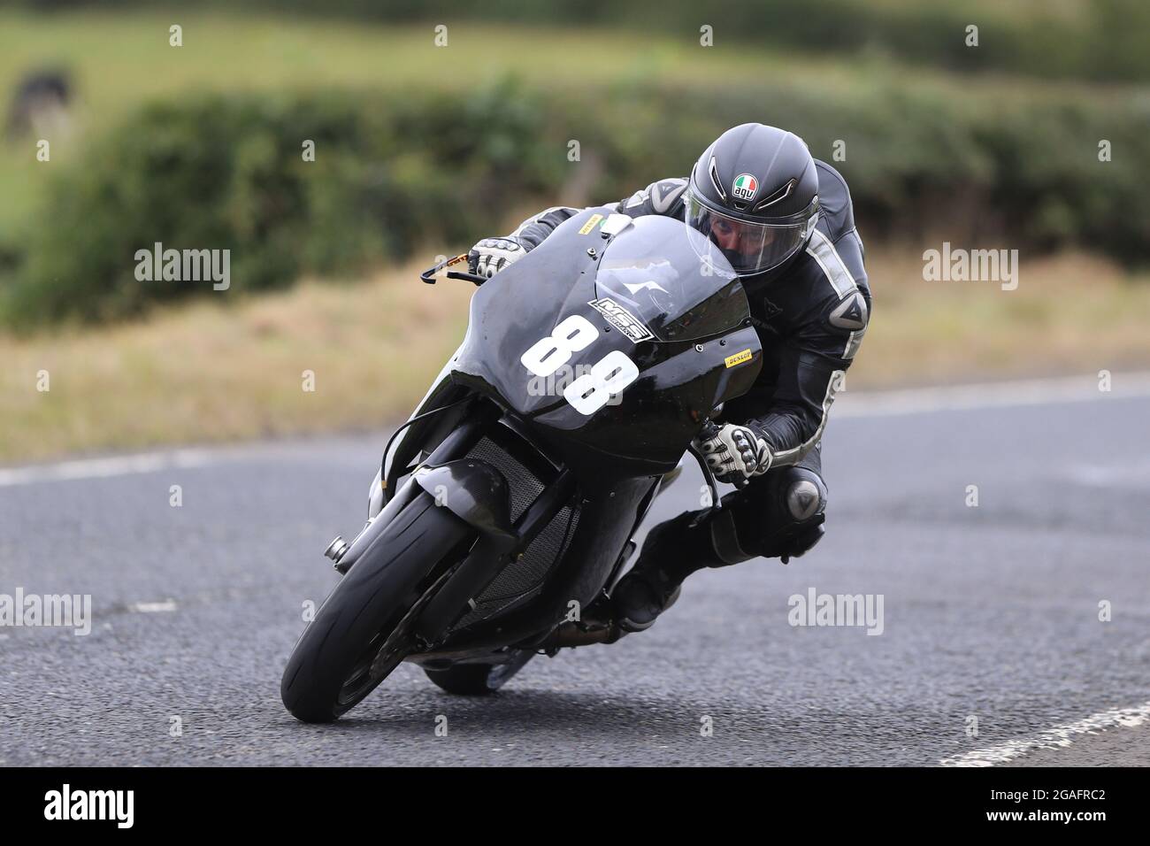 Armoy, Antrim, Northern Ireland. 30th July, 2021. Armoy Road Races, The Race of Legends Motor Cycling, Day One; Guy Martin in action during the SuperTwins qualifying Credit: Action Plus Sports/Alamy Live News Stock Photo