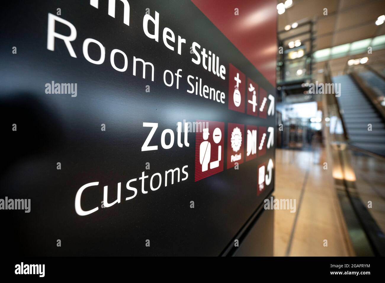Berlin, Germany. 30th July, 2021. 30 July 2021, Berlin, Schönefeld: A sign indicates customs in the main hall of Berlin Brandenburg Airport (BER). Photo: Fabian Sommer/dpa Credit: dpa picture alliance/Alamy Live News Stock Photo