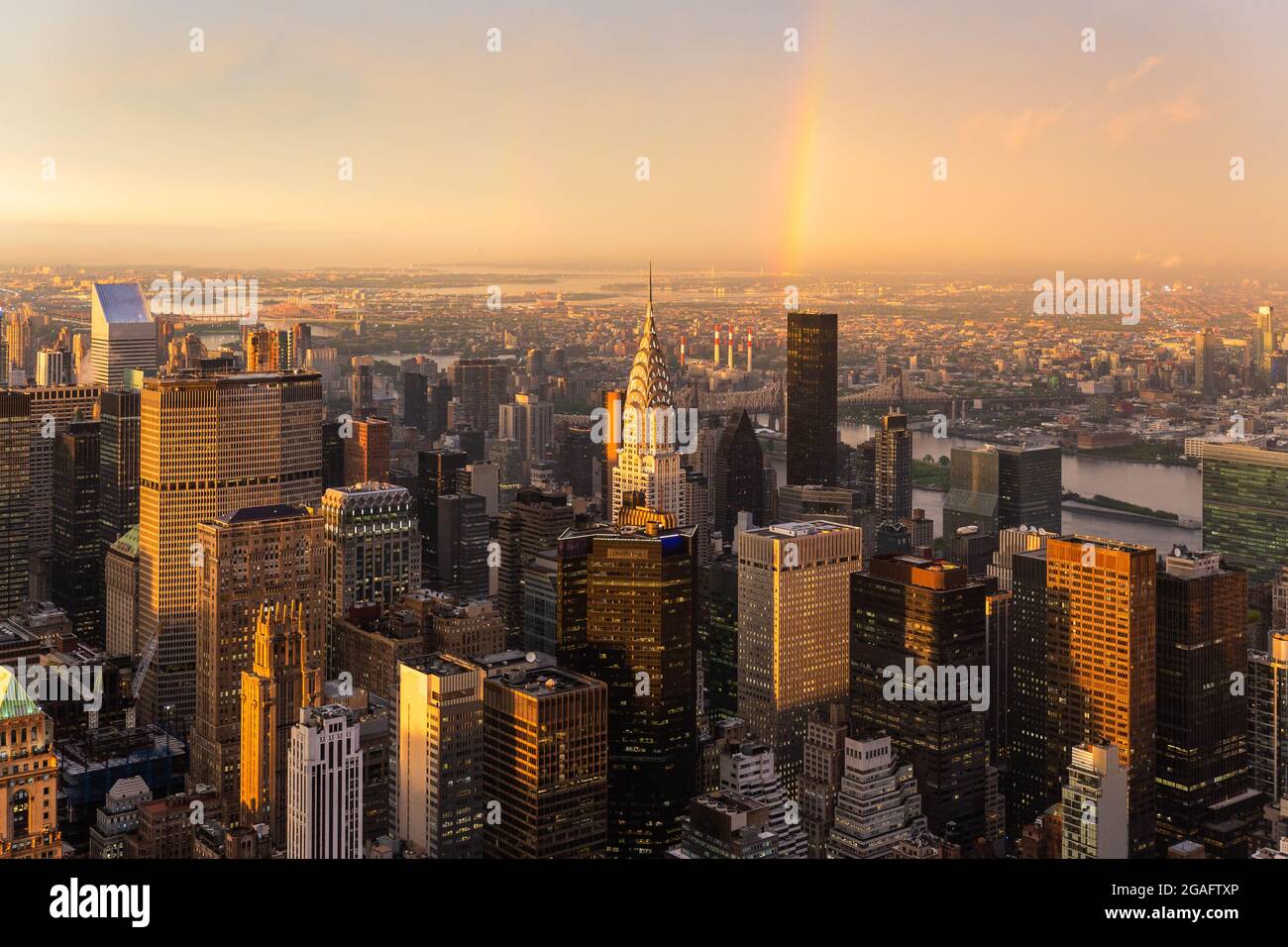 New York City skyline with Manhattan skyscrapers at dramatic stormy sunset, USA. Stock Photo