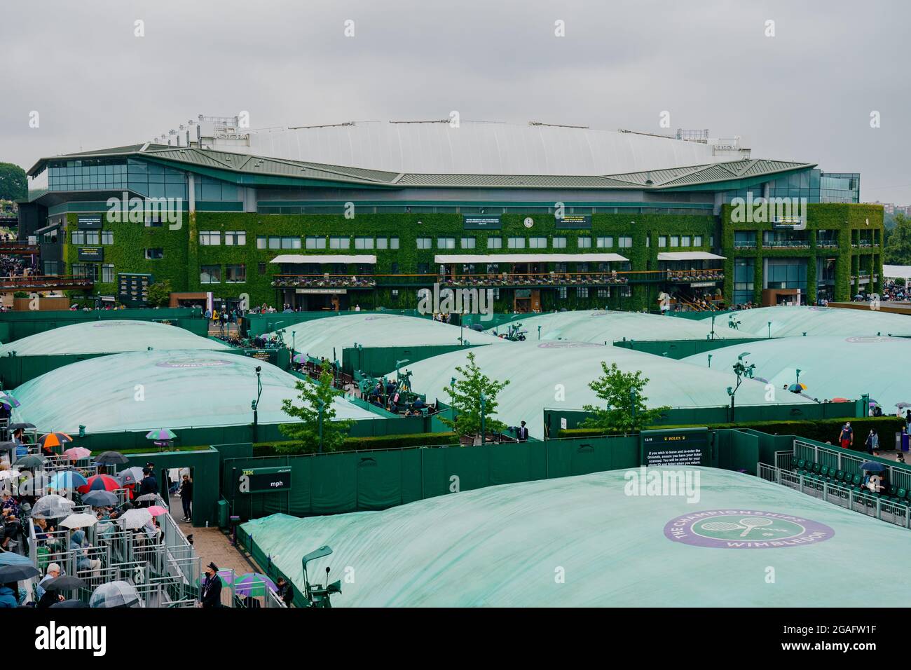 General view of covered courts in the rain during The Wimbledon Championships 2021 Stock Photo