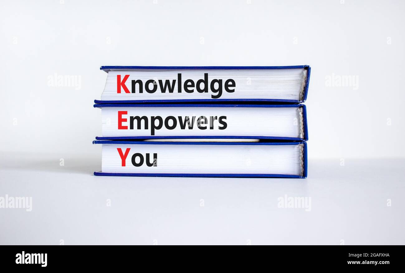 KEY, knowledge empowers you symbol. Books with words 'KEY, knowledge